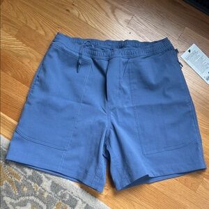 Men's Lululemon blue shorts, new with tags size medium
